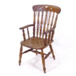 A Victorian Windsor kitchen elbow chair