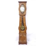 An Antique French Comtoise clock, with enamelled dial and a painted pine case, complete with