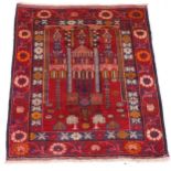 A red ground Beluchi rug, 116cm x 94cm