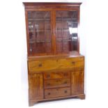 A 19th century mahogany 2-section secretaire bookcase, the lower section having a fall-front