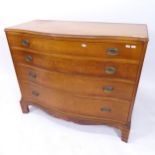 A 1920s chest of 4 drawers of serpentine form, with label for Baker of Allegan Michigan, W106cm,