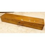 A stained pine storage box with carrying handle, L102cm, H15cm, D23cm
