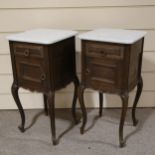 A pair of 19th century French oak bedside cupboards, with white marble tops and cabriole legs, width