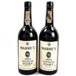 2 bottles of Warre's 1975 vintage port. Levels to low neck, capsules intact.