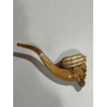 A large 19th century carved Meerschaum pipe, in the form of an Arab man wearing a turban, silver and