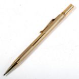 A 9ct gold propelling pencil, by Carrington & Co, hallmarks Birmingham 1934, boxed Very good
