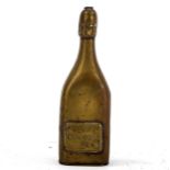 An Austrian brass novelty Vesta case, in the form of a bottle of Henri Clicquot Champagne, length