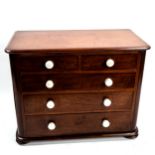 A Victorian mahogany apprentice chest of drawers, with ceramic handles and bun feet, width 38cm,