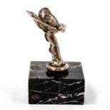 A small electroplate Spirit of Ecstacy car mascot, on marble base, height 9cm