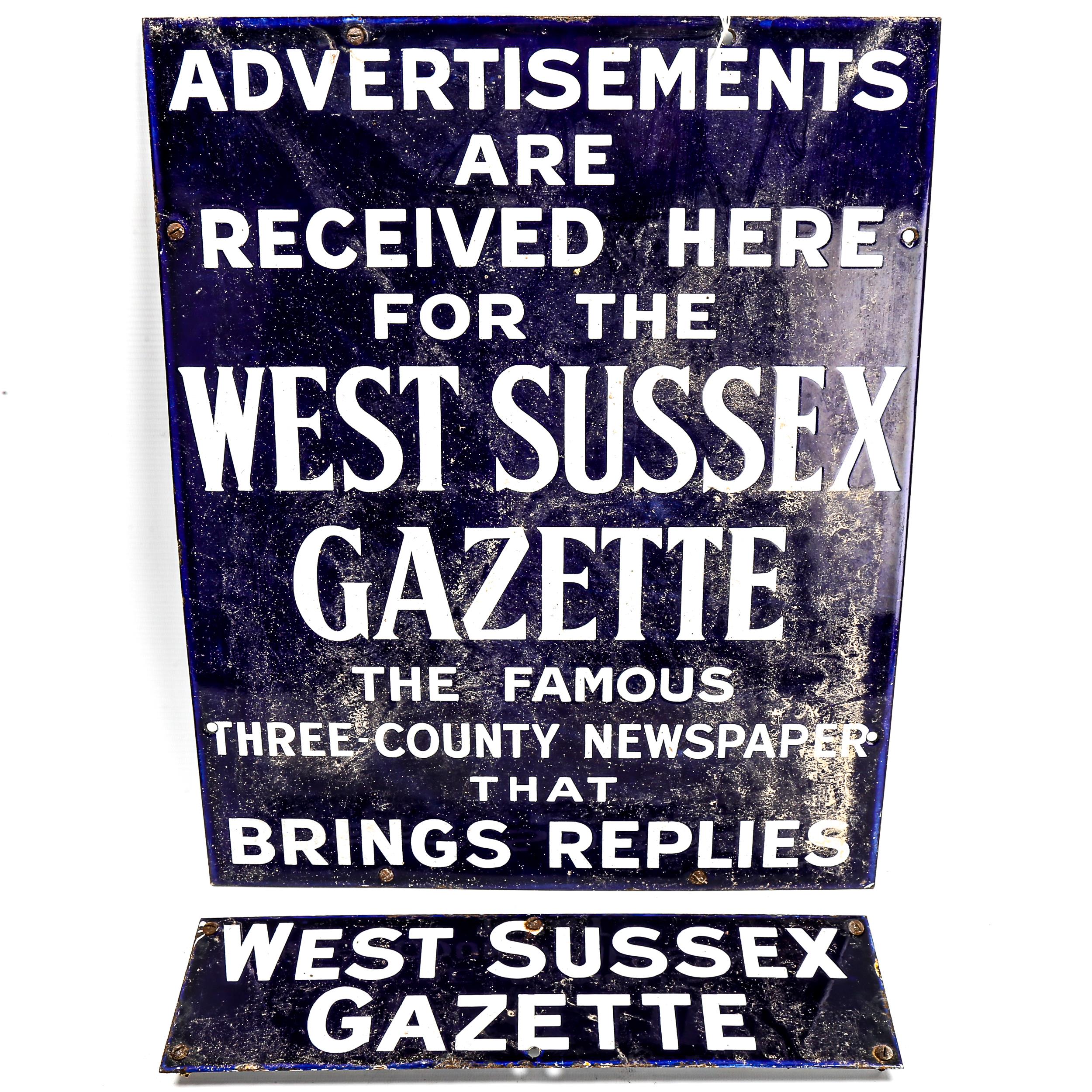 2 early 20th century blue and white enamel advertising signs for The West Sussex Gazette, 47cm x