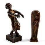 A miniature patinated bronze figure of a satyr, circa 1900, unsigned, height 7cm, and a patinated