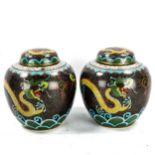 A pair of Chinese cloisonne enamel jars and covers, with dragon designs, height 18cm