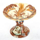 A Japanese porcelain tazza with painted and gilded decoration, signed under base, diameter 17.5cm,