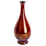 Pilkington's Royal Lancastrian dark red glaze pottery narrow-neck vase, with incised floral