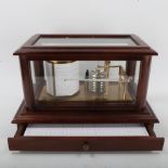 A modern Rapport barograph in glazed mahogany case, length 37cm