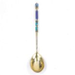 A 19th century Russian 84 zolotnik standard silver and champleve enamel spoon, indistinct maker's