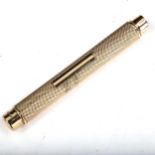 SAMPSON MORDAN & CO - an early/mid-20th century 9ct gold propelling pencil, engine turned decoration