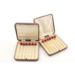 Two cases of silver and celluloid beaded cocktail sticks, Birmingham 1927, contained in two cases