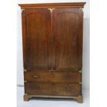 Campaign style mahogany gentleman's wardrobe, late 19th Century, cavetto moulded cornice over two