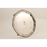 George VI silver salver, Birmingham 1938, circular form with gadrooned raised border, supported on