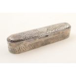 Edwardian hammered silver box, by William Comyns, London 1903, elongated form centred with a