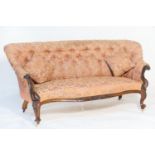 Early Victorian rosewood and upholstered settee, circa 1845, deep buttoned pink foliate fabric