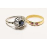 Sapphire and diamond cluster ring, in 18ct white gold, size K, gross weight approx. 3.9g; also a