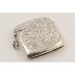 George V silver vesta case, Birmingham 1911, engraved with foliate scrolls and initialled cartouche,