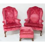 Pair of faded red fabric upholstered wing armchairs in the Georgian style, 20th Century, with