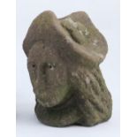 Tudor carved sandstone corbel, 16th Century, carved as a gentleman wearing a decorative hat, with