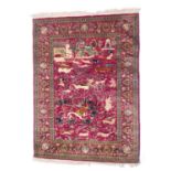 Fine pictorial hunting rug, late 20th Century after a Mughal original, the ruby red field