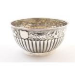 Silver small rose bowl, early 19th Century (marks rubbed), half reeded and worked at the rim with