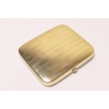 9ct gold cigarette case by Deakin & Francis, Birmingham 1938, cushion form with engine turned