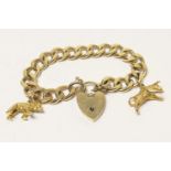 9ct gold solid curb link bracelet, with 9ct gold padlock clasp, with safety chain, length 16cm,