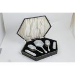 George V enamelled silver dressing table set, maker R.C., London 1929, finished in silver grey