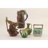 Continental majolica performing bear jug, late 19th Century, richly decorated in lead glazes, the