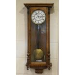 Late Victorian walnut Vienna wall clock, circa 1890, white dial with Roman numerals, subsidiary