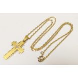 Polish 14ct gold and diamond cross pendant necklace, the pendant centred with an old cushion cut