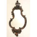 Quality Rococo Revival mahogany wall mirror, late 19th Century, asymmetrical shape with bevelled