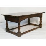 Charles II joined oak table, circa 1660-80, cleated plank top over a plain frieze, with baluster