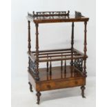 Victorian burr walnut canterbury whatnot, having a fretwork three-quarter gallery top, the base with