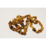 Natural Baltic amber necklace, with colours ranging from yellow, orange and white, length 70cm,