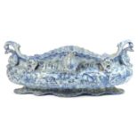 Impressive and large Savona blue and white maiolica table centre, 19th Century, boat shape with mask