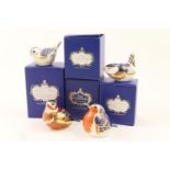 Four Royal Crown Derby bird paperweights comprising Robin, height 7cm, Chaffinch, height 7cm, Gold