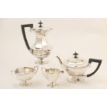 George V silver four piece tea service by Walker & Hall, Sheffield 1933, 34 and 35, comprising