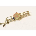 Edwardian 15ct gold enamelled diamond and sapphire bar brooch, worked as a water lily, on an open