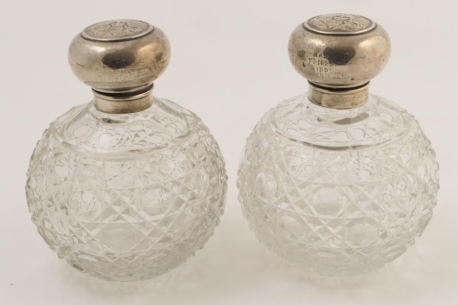 Pair of Edwardian silver mounted cut glass scent bottles, Chester 1903, en suite to the previous