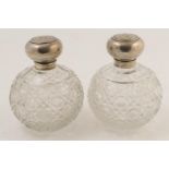 Pair of Edwardian silver mounted cut glass scent bottles, Chester 1903, en suite to the previous