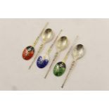 Six modern enamelled silver gilt spoons, maker T&S, Birmingham 1978, each of Celtic form with a