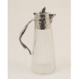 Late Victorian cut glass claret jug, circa 1900, having silver plated mounts and hinged lid,